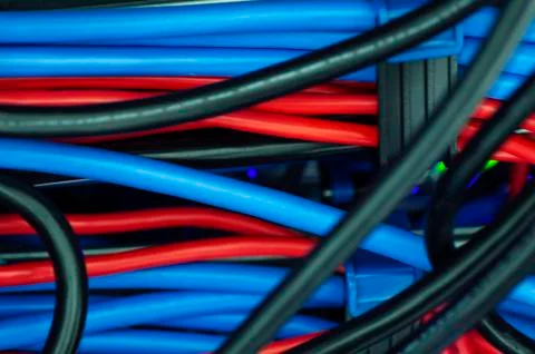 Tangled network cables and wires in server room for Unorganized cabling in da Stock Photos