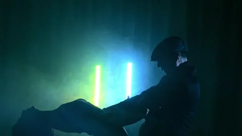 Tango Instructor and Student Performing Under Dramatic Lights Stock Footage 303365924