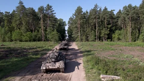 Tank column driving into road Stock-Footage 250980302