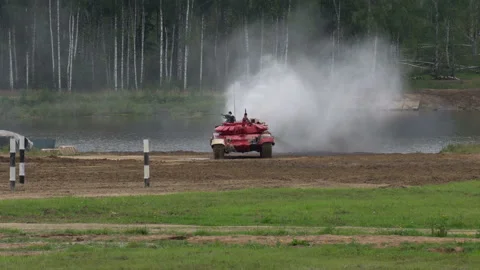 The tank drives through the range at high speed Video stock 138313976
