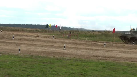 The tank drives through the range at high speed Stock Footage 138315425