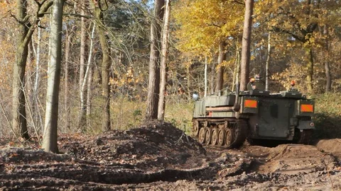 Tank Driving Into A Forest Stock Footage 127433836