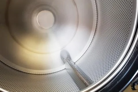 Tank empty washing machine inside Stock Photos