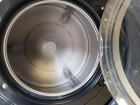 Tank empty washing machine inside Stock Photos