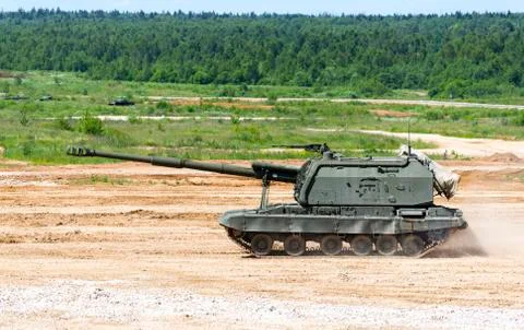 Tank on a field Fotos de archivo