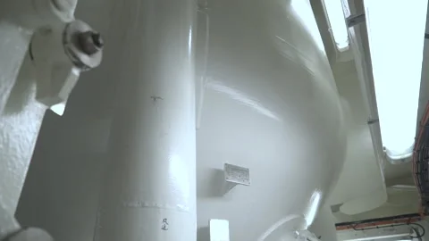 Tank inside room. Lower part of a large vertical tank. Stock Footage 243450866