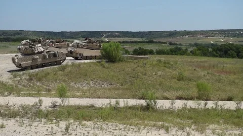 Tank pulling into position at firing range Stock Footage 114059663