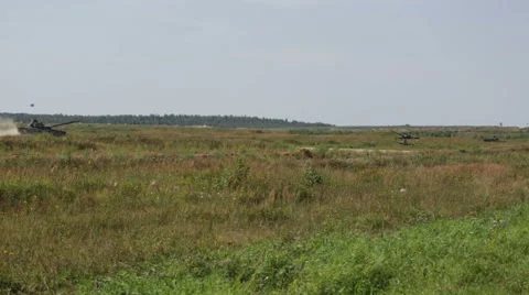 Tank quickly rides on the field Stock Footage 65962065