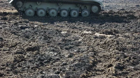 Tank rides on the spring field. Stock Footage 63087779