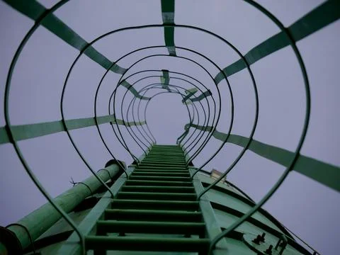 Tank stairs seamless pattern presenting around sky industrial background. Stock Photos
