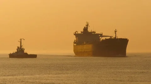 Tanker Atlantic Olive inbound during sunset Stock Footage 74357746