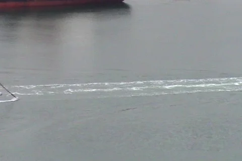 Tanker Being Tugged In The Harbor Stock Footage