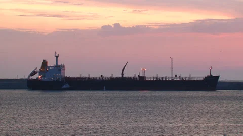 Tanker in the harbor at sunset Stock Footage 30840551