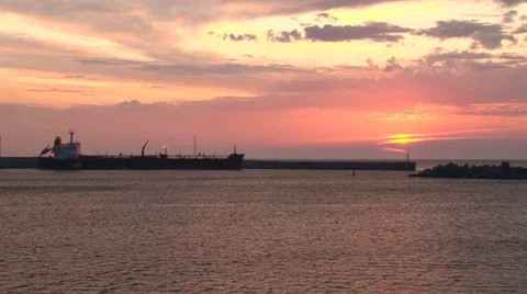 Tanker moored at sunset Stock Footage 30840585
