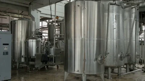 Tanks and filter for purification in the plant for fruit processing, pan left, w Stock Footage 69212174