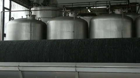 Tanks and filter for purification rotates in the plant for fruit processing, by Stock Footage 69212324