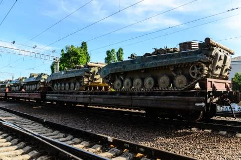 Tanks on a freight platform Stock Photos
