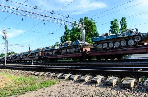 Tanks on a freight platform Stock Photos