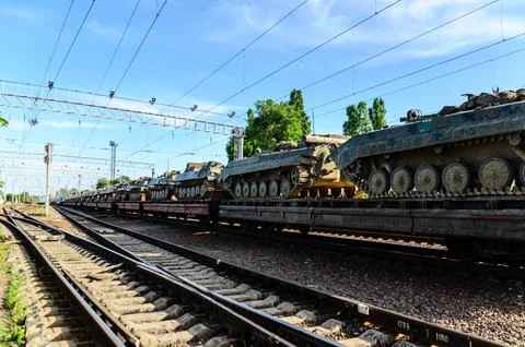 Tanks on a freight platform Stock Photos