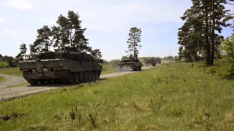 Tanks on the move heading out in the woods Stock Footage 110885231