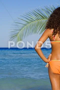 Tanned woman on beach summer vacation Stock Photos