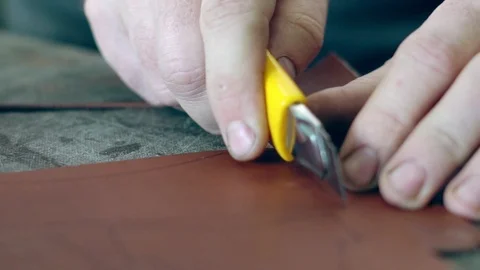 Tanner cuts the skin Stock Footage 99728902