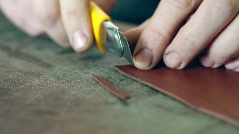 Tanner cuts the skin Stock Footage 101223967