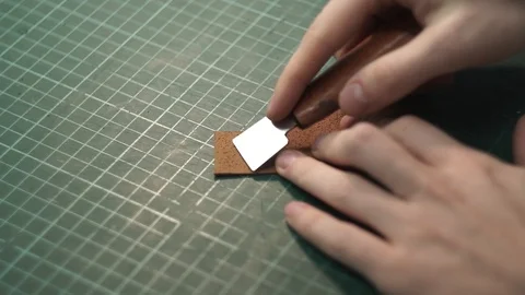 The tanner manually slims the skin Stock Footage 104928058