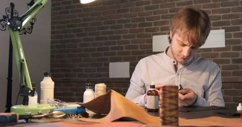 Tanner Processes Leather Edges, Small Business at Leather Industry Stock Footage 133008958