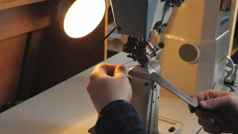 The Tanner scribbling piece of leather for manufacturing leather goods at the Stock Footage 124613843