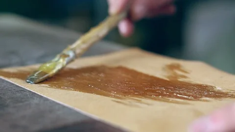 Tanner at work in the workshop Stock Footage 100656713