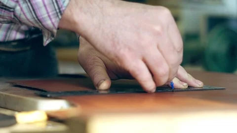 Tanner at work in the workshop Stock Footage 101572197