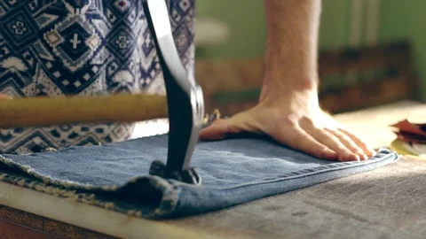 Tanner at work in the workshop Stock Footage 101942084