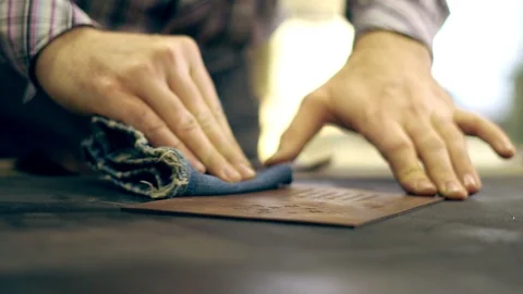 Tanner at work in the workshop Stock Footage 104595980