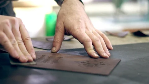 Tanner at work in the workshop Video stock 104596026