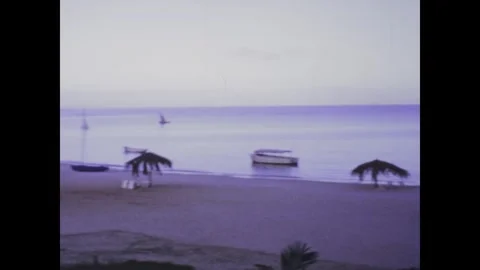 Tanzania 1973, Tranquil Beach Resort: Discovering the Magic of Tanzania's C.. Stock Footage 244593267