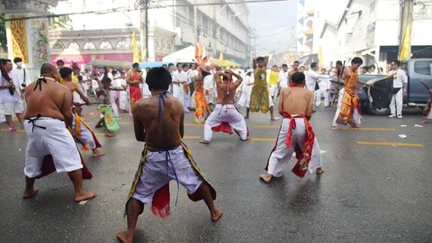 Taoist Devotees Self Harming with Axe During Vegetarian Festival Stock-Footage 71133789