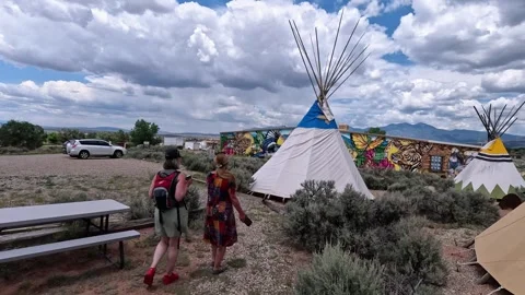 Taos Drums Gallery, Local decor - imitation Indian tepees, NM Stock Footage 334576050