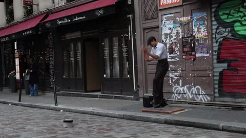 Tap dancer with beret hat dancing on the street, busker performer. Stock Footage 327545394