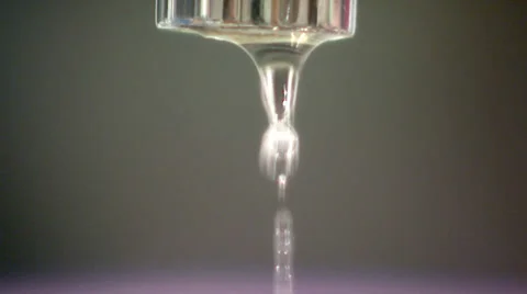 Tap dripping against black background. High quality HD video footage Vídeo Stock 32934476