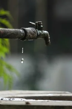 The Tap With Dropping Water Stock Photos