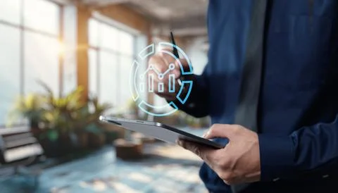 Tap the graph chart icon to view the data trends and performance metrics Stock Photos