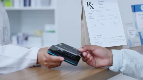 Tap to pay, NFC and simple payment with a credit card in a pharmacy, drugstore Stock Footage 204851170