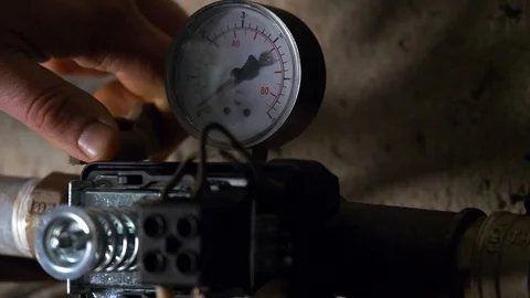 The tap is turned. pressure rises Stock Footage 102234516