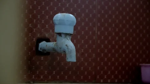 Tap water dipping closing with hands unique angle pollution wastage close up 4k Video stock 123725048