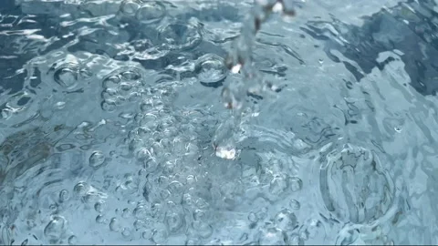 Tap water flows into a container, clean clear water dripping Stock Footage 192984739