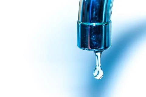 Tap from which water flows. Stock Photos