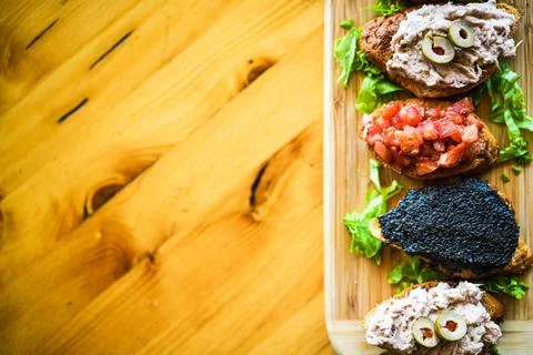 Tapas on crusty Bread Stock Photos