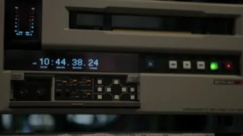 Tape being ejected out of a BetaCam Deck. 動画素材 10610204