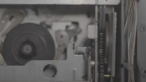 Tape being Placed into VHS deck inside Stock Footage 130337002